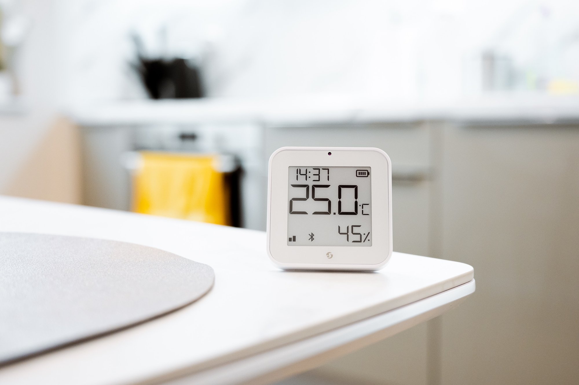A product display image showing a Shelly Blu H&T display unit or related smart home device.